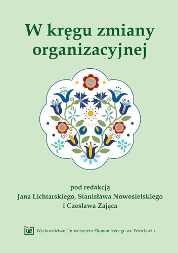 Jasnozielona okładka, na środku  kolorowy kwiatek  złożony z kaszubskich ludowych motywów. U góry tytuł, na dole logo.