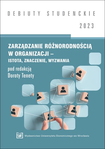 Okładka w kolorach bieli i szarej zieleni, pośrodku kafelki przedstawiające drewniane kostki z namalowanymi czarnymi popiersiami połączone ze sobą białymi liniami.