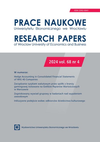 Biało-szara okładka czasopisma. U góry tytuł pracy, poniżej na szarym tle opis zawartości publikacji, w czerwonym prostokącie kolejny jej numer.