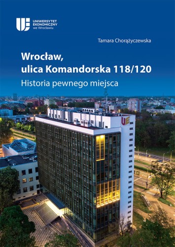 Okładka w ciemnych kolorach z białym tytułem, przedstawia jeden z budynków UEW tzw. "ZETKĘ" na tle Wrocławia.